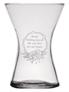 a glass vase with an inscription on the bottom that says, beryl wishing you all the very best for the future