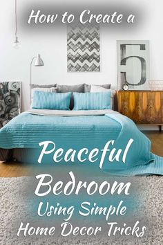 a bedroom with blue bedding and white rugs on the floor, text reads how to create a peaceful bedroom using simple home decor tricks