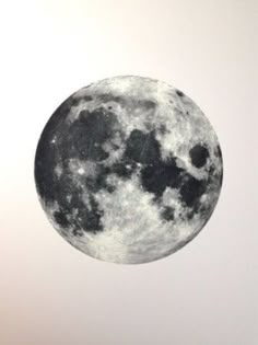 the full moon is shown in black and green colors, as well as an image of its