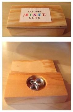 a wooden box that has some metal buttons in it