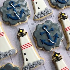 decorated cookies are displayed on a table