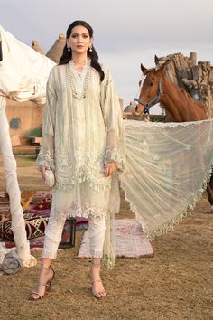 Brand new. 100% Original Maria B Luxe Lawn 2021. Please read the notes below carefully before placing the order. Fabric details. * Yarn dyed woven shirt * Embroidered net dupatta * Printed cambric trouser * Embroidered sleeve lace * Embroidered organza neckline lace * Embroidered ghera patch * Embroidered ghera lace Note: 1) Please select the preferred size from the list or message me if you would like custom made. 2) Size chart is mentioned in the listing pictures. 3) If you choose to purchase the suit in the form of unstitched fabric, you will receive the fabric that is mentioned under fabric details. No extra accessories (faux pearls, beads, laces etc.) will be included in the package. 4) This suit has a longer handling time, if you need it sooner please send me a message. There might b Gulsim Ali, Maria B Lawn, Summer Hacks, Pakistani Dresses Online, Pakistani Street Style, Pakistani Designer Suits, Dress Salwar Kameez, Pakistani Salwar Kameez, Maria B