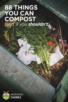 there is a trash can filled with green plants and other things that are on the ground