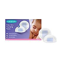 two baby nursing pads are shown in front of a white box with the words, stay dry