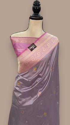 🌟 Elevate your wardrobe with the luxurious beauty of Pure Katan Silk Banarasi Handloom Saree! ✨ Adorned with exquisite Kadua motifs and delicate Meenakari work, this saree is a must-have for every fashionista. 💰 Get yours now for just ₹29999.00! 💃🏻 Don't miss out on this timeless piece, shop now and slay all day! 💁🏻‍♀️ #PureKatanSilk #Banarasi Designer Wear Unstitched Meenakari Suit, Designer Wear Unstitched Suit With Meenakari In Traditional Drape, Designer Silk Blouse Piece With Meenakari Detailing, Silk Blouse Piece With Meenakari And Traditional Drape, Silk Meenakari Blouse Piece, Designer Jamawar Handloom Saree, Unstitched Meenakari Tussar Silk Blouse Piece, Transitional Season Silk Meenakari Blouse Piece, Transitional Meenakari Paithani Silk Blouse Piece