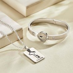 Buy 3 items from my shop and you will get free shipping Express your love with this Custom Engraved Concentric Lock Bracelet Key Necklace Set. Made of high-quality materials, this unique couple gift features a stunning concentric design that symbolizes the deep connection between two souls. Personalize the lock and key with your own engravings to make it truly special. Perfect for anniversaries or as a romantic gesture, this matching set serves as a meaningful keepsake of your relationship. Order now and cherish your love forever!Keywords: Engraved lock, key necklace, couple gifts, personalized jewelry, concentric design, custom engraving, romantic accessories, matching set, love symbol, anniversary present, relationship token, meaningful keepsake handmade jewelry Couples' Stainless Steel Bracelets As Gifts, Couples Stainless Steel Bracelets As Gifts, Couples Metal Jewelry For Gifts, Couples' Metal Jewelry Gift, Silver Couples Jewelry Gift, Couples Silver Jewelry Gift, Silver Couples Jewelry As A Gift, Couples' Silver Jewelry Gift, Personalized Silver Couples Jewelry