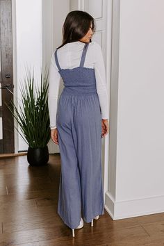 - Dare to let your style shine with this trendy jumpsuit! - Unlined material - A ruffled square cut neckline - A sleeveless cut with 1 inch spaghetti straps - Frayed accents - Functional side pockets - A relaxed silhouette that ends in straight hemlines Trendy Jumpsuit, Square Cut, Smocking, 1 Inch, Spaghetti Strap, Spaghetti, Jumpsuit, Square, Blue