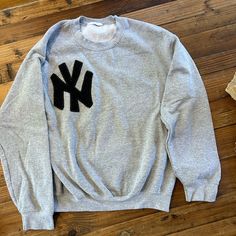 Nwot, Never Worn, Crew Neck Sweatshirt With Embroidered Felt Ny Emblem. Slightly Oversized Size Small, Hits At Hips. Grey Sweatshirt Embroidery, College Embroidered Sweatshirts, Ny Hoodie, New York Sweatshirt, Patchwork Clothes, Embroidered Felt, Grey Crewneck, Embroidery Sweatshirt, Winter Clothes