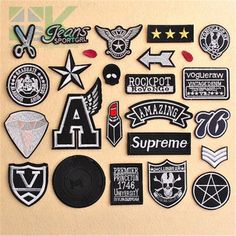 various patches and stickers on a wall