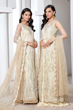 Brand: ZarifProduct: ZP-05 IvoryCollection: Pareesia by Zarif Luxury Formal Wear CollectionFabric: Net Back & Back Top: Sequins Embroidered Net Shirt Front & Bach: Sequins Embroidered Net Sleeves: Sequins Embroidered Net Dupatta: Sequins Embroidered Net Sleeves Lace: Contrast Sequins Embroidered Grip Trouser: Dyed Raw Sills Pareesia by Zarif Luxury Formal Wear Collection 2022 Authenticity Guaranteed – 100% Original Brand. 3 Days Return Policy T&C apply. International Delivery. Faisal Fabrics Sto Net Sleeves, Net Shirt, Formal Wear Women, Organza Sleeves, Luxe Wedding, Embroidered Dupatta, Pakistani Wedding Dresses, Festive Wear, Pakistani Dress Design