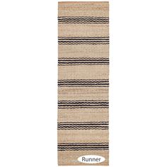 a runner rug with black and white stripes on the bottom, in front of a white background