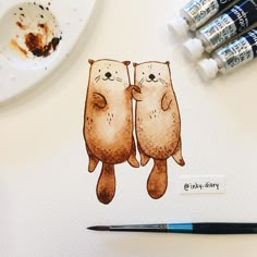 two otters hugging each other on top of a piece of paper with crayons next to it