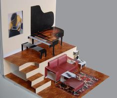 a living room filled with furniture and a piano on top of a hard wood floor