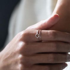 The Diamond Dusted Karma Ring is an understated reminder that you get what you give.A union of simplicity and meaning, the circle on the ring features our signature diamond dusted texture.details+ ring band measures approximately 1.5 mm wide+ available ring sizes 4 - 10.5 (half & whole sizes)+ handmade with love in our Georgia studioavailability handmade to order. ships in 5 - 14 days.          pressed for time? select the rush your order option to have your item made in 1 - 2 business daysd Minimalist Initial Ring With Round Band For Promise, Minimalist Stackable Initial Ring For Promise, Minimalist Stackable Initial Promise Ring, Minimalist Round Band Midi Rings For Promise, Simple Stackable Initial Ring, Minimalist White Gold Stackable Promise Rings, Minimalist Stackable Midi Rings For Promise, Minimalist Midi Promise Rings, Minimalist White Gold Ring For Everyday