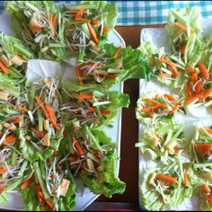 lettuce and carrots are arranged on plates