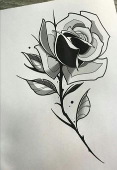 a drawing of a rose with leaves on it's side and the petals in black ink