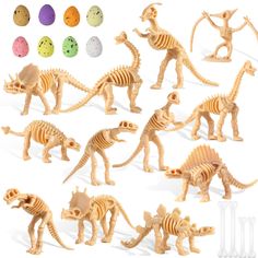 an assortment of toy dinosaurs with eggs in the background