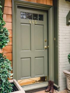 an image of a green front door with the words google com search above it and below that reads, elements of style blog