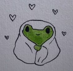 a drawing of a frog wrapped in a blanket with hearts floating around it's head