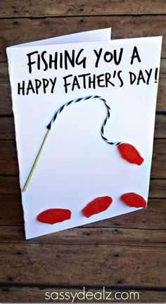 a father's day card with a fishing hook on it and the words fishing you a happy father's day