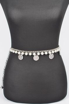 Add a touch of elegance to any outfit with our Fringe Disk Iconic Pearl Station Chain Belt. The delicate fringe disk design and iconic pearl stations bring a sense of sophistication and class to your look. This belt is the perfect accessory for any occasion, providing both style and functionality. One SizeWidth - 0.5"Length - 47"Rhinestone, IronLead & Nickel Compliant Adjustable Silver Elegant Waist Chain, Silver Adjustable Chain Belt Fashion Accessory, Silver Adjustable Chain Belt, Silver Waist Chain With Pearl Detail, Adjustable Silver Beaded Waist Chain, Elegant Silver Chain Belt With Rhinestones, Elegant Silver Waist Chain With Pearls, Elegant Silver Pearl Chain Waist Chain, Silver Beaded Waist Chain