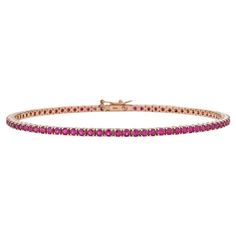 Our gold ruby tennis bracelet is finally here. We couldn’t find the perfect ruby tennis bracelet at an affordable price point, so we created it! This ruby tennis bracelet yellow gold is not only sleek and feminine but also has an affordable price tag that will make any budget happy! Featuring gorgeous, 3.3 carats of brilliant rubies, this bracelet is a must-have! Our ruby tennis bracelet features genuine 1.9mm rubies in a four-prong setting. In bright light, the rubies appear a hot pink color. I Bracelet Tennis, Hot Pink Color, Luz Natural, Red Ruby, 3 Carat, Bright Light, Natural Ruby, Color Rosa, Tennis Bracelet