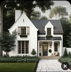 a white house with black shutters and windows on the front door is surrounded by greenery