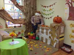 a child's room decorated for halloween with pumpkins and decorations