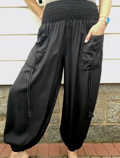 Our black harem pants are made from soft, light rayon. Smocked, elastic waist. Front pockets. Handmade in India. S/M = sizes 2-8, M/L = sizes 9-12 Black Harem Pants, Clothes Crafts, Soft Light, Free Clothes, Smocking, Harem Pants, Lotus, Elastic Waist, Floating