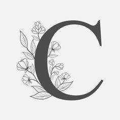 the letter c with flowers and leaves