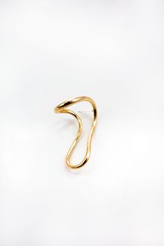 The Enzo Earring offers a unique curved design and glow that stands out with stylish and independent spirits. Add energy and interest to your outfits with this beautiful accessory that will help you feel your best. The curved design along with the cut and color make it a dynamic piece of jewelry. The fresh gold shine and alternating curves helps to create a statement piece. The shape is unlike any other you will find and seems to defy gravity. You won’t be able to wear it long before people stop Elegant Spiral Ear Cuff, Elegant Spiral Single Ear Cuff, Elegant Spiral Shaped Single Ear Cuff, Statement Earring, Gold Plated Earrings, The Shape, Cut And Color, Gravity, Statement Earrings