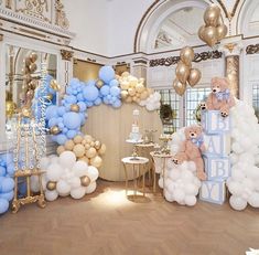 a baby shower with balloons and teddy bears