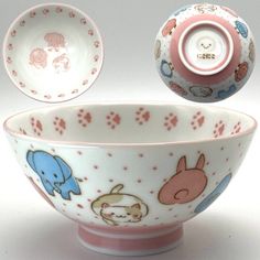 a small bowl with an animal design on it and a cup next to the bowl