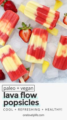 four popsicles with strawberries and lemons on top of ice cubes next to each other