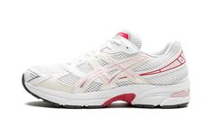 The ASICS Gel-1130 GS “Pink Salt” is the youth sizing of the retro shoe with pink accents.  The ASIC Gel-1130 at hand features a white open-mesh construction with Pink Salt synthetic leather overlays with a metallic finish.  A “Gel-1130” logo appears on the tongue and “Gel” is spelled out on the inserts on the collar overlay.  Underfoot, the shoe’s techy-looking midsole features ASICS’ signature Gel cushioning technology for a comfortable ride. Asics Gel 1130, Yeezy Womens, Pink Asics, Dream Shoe, Shark Skin, Shoe Wall, Nike Dunk High, Cute Nike Shoes, Pink Salt