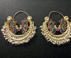 *It is Handmade Indian Ethnic Kundan Chandbali Earrings. *Its made from Silver and Copper with White Kundan Stones Settings with 22k gold Plating. *It gives Pure Ethnic Look with Antique Chandbali and 1.8 inch size. *Our all jewelry is made from semiprecious stones and beads. *WARRANTY: ITS GENUINE HANDMADE JEWELRY AND WE GIVE LONG LIFE WARRANTY FOR OUR ALL ITEMS. All of our Kundan Jewelry is 100% handmade with ancient Kundan stone setting method using silver foils. It is one of the most favorab Traditional Kundan Hoop Earrings With Meenakari, Multicolor Chandbali Earrings With Cutdana, Kundan Earrings With Peacock Design For Navratri, Kundan Chandbalis With Peacock Design, Navratri Kundan Earrings With Peacock Design, Traditional Hoop Earrings With Cutdana For Celebrations, Multicolor Cutdana Chandbali Bridal Earrings, Traditional Cutdana Hoop Earrings For Celebrations, Multicolor Peacock Design Chandbalis For Wedding