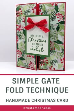 a handmade christmas card with the words, simple gate fold technique and red ribbon