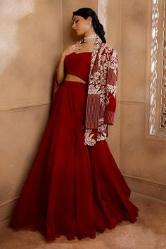 Red jacket with cutdana, zari, pearl embroidery in flower pattern. Paired with solid padded blouse and attached cancan lehenga. - Aza Fashions Red Festive Outerwear For Party, Festive Red Outerwear For Party, Festive Red Party Outerwear, Red Long Sleeve Outerwear For Wedding, Red Outerwear With Resham Embroidery For Festive Occasions, Red Lehenga With Sheer Dupatta And Long Sleeves, Red Festive Outerwear For Wedding, Red Outerwear For Wedding And Festive Season, Festive Red Outerwear For Weddings