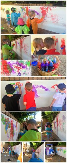 some kids are painting on the wall with different colors and shapes to make them look like they're having fun