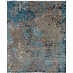 an abstract rug with blue and gray colors