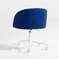 an office chair with wheels and a blue upholstered seat cover on the back