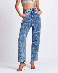 This slouchy straight jean features rhinestone-encrusted beadwork that is sewn entirely by hand. Oversized, 90’s-era fit with a high-waisted fit. Rigid denim with minimal stretch. This is a couture piece that is made entirely by hand. Zip front closure. Made in Brazil. 100% COTTON. CAL26990US. Jeans With Sequins, Denim Eras Tour Outfit, Bedazzled Jeans Outfits, Denim Rhinestone Outfit, Diy Bedazzled Jeans, Denim And Rhinestone Outfit, Denim And Diamonds Outfit, Rhinestone Outfits, Sparkle Cowgirl