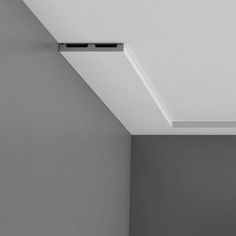 a black and white photo of the ceiling in a room