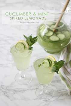 cucumber and mint spiked lemonade in glasses on a marble countertop with text overlay