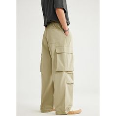 Spring/Summer Big Pocket Parachute Wide Leg Cargo Pants Fabric: 100% Polyester Size: S, M, L, XL Multiple Color Selections: Khaki  Season: Spring, Fall, Summer Summer Wide-leg Parachute Pants With Pockets, Summer Outdoor Cargo Pants With Pockets, Baggy Utility Harem Pants With Elastic Waistband, Khaki Utility Pants With Elastic Waistband, Baggy Khaki Parachute Pants With Pockets, Summer Cargo Pants With Multiple Pockets For Outdoor, Summer Leisure Pants With Pockets, Summer Outdoor Solid Color Pants, Spring Khaki Cargo Pants With Loosely Fitted Hips