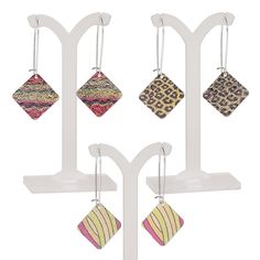 Each diamond shape on these earrings showcases a playful array of colors in fun patterns designed to delight the eye and draw attention whether they're on your ears or in a display. Colors, shapes and sizes may vary in each lot. Nickel-free Multicolor Metal Hoop Earrings, Nickel Free Multicolor Metal Hoop Earrings, Multicolor Metal Ear Wire Earrings, Multicolor Metal Earrings With Ear Wire, Multicolor Metal Hoop Earrings With Ear Wire, Trendy Multicolor Hypoallergenic Earrings, Modern Adjustable Multicolor Earrings, Fun Patterns, Diamond Shape