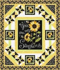 a quilt with sunflowers and the words you are my sunshine