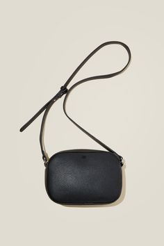 ELODIE CROSS BODY BAG Everyday Black Camera Bag With Mobile Phone Pocket, Chic Black Camera Bag For Everyday Use, Trendy Black Camera Bag For On-the-go, Trendy Black Camera Bag For Travel, Chic Black Camera Shoulder Bag, Chic Black Shoulder Camera Bag, Casual Black Camera Bag With Adjustable Strap, Black Crossbody Camera Bag For On-the-go, Black Crossbody Belt Bag