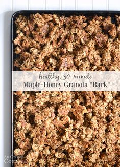 homemade maple - honey granola bark in a baking pan