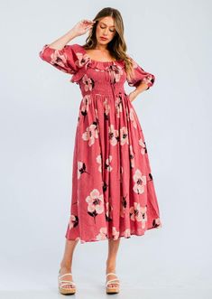 Easy floral midi dress featured in a flowy silhouette with a smocked bodice and volume sleeves. Cotton voile, textured fabrication  Relaxed fit  Side pockets -Contents 70%Cotton 30%Rayon Approximate measurements are as follows Small: Length:48 3/4 " Bust: 29"- 49"  Waist: 28- 48" Medium: Length:49 1/4" Bust:31"-51"    Waist 30- 50"  Large: Length:49 3/4" Bust:33"-53" Waist 32 -52" Floral Print Mid-length Maxi Dress For Garden Party, Flowy Knee-length Smocked Sundress, Flowy Ruched Floral Dress For Spring, Spring Flowy Floral Dress With Ruched Detail, Flowy Smocked Midi Sundress, Flowy Midi Smocked Sundress, Flowy Sundress Smocked Midi Dress, Feminine Floral Print Midi Dress With Square Neck, Knee-length Floral Print Midi Dress For Garden Party